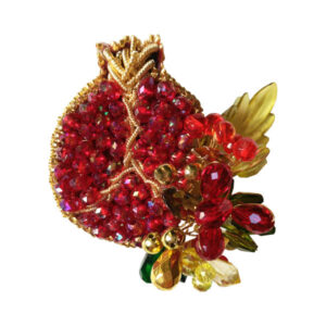 Granaatappelbroche – symbolisch en elegant