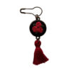 Geborduurde broche – rood bloemenmodel