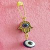 Boze-oog veiligheidsspeld broche met handontwerp – spirituele bescherming