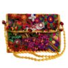 Geborduurde fluwelen clutch handtas met bloemcirkels