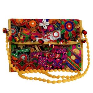 Geborduurde fluwelen clutch handtas met bloemcirkels