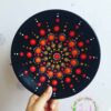 Decoratief aardewerken bord handgeschilderd dot-art Zon