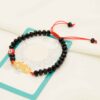 Zwarte kralenarmband met Boze Oog-vogel voor vrouwen