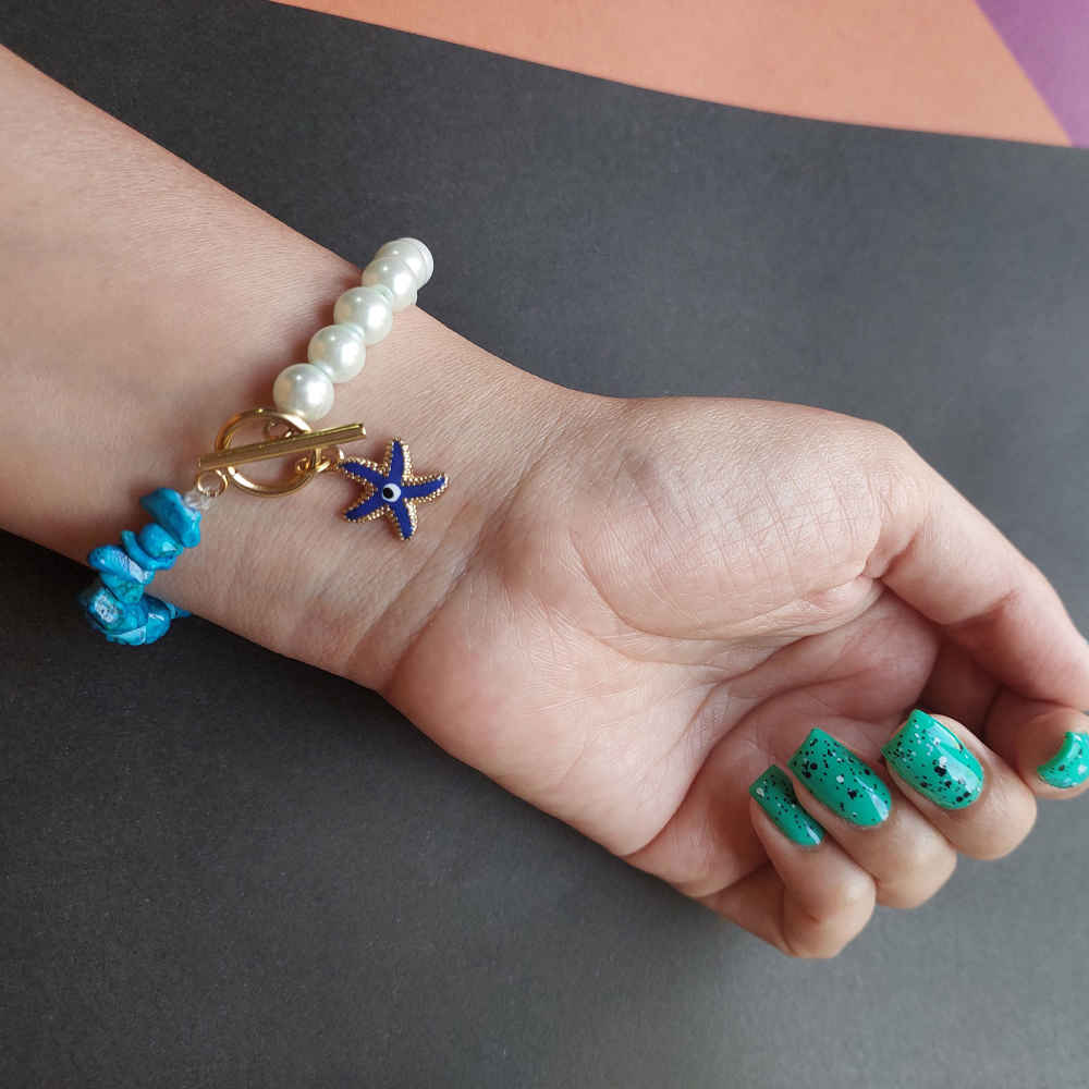 Kralenarmband voor Dames – Koraal en Blauwe Oog