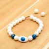 Witte kralenarmband met Boze Oog voor vrouwen