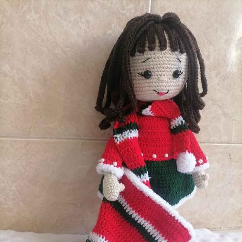 Amigurumi handgemaakte gehaakte pop kerstmeisje