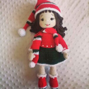 Amigurumi handgemaakte gehaakte pop kerstmeisje