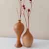 Set handgemaakte houten mini-bloemenvazen met rustieke stijl, perfect voor warme decoratieve arrangementen
