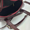 Maroon Lederen Bauletto Handtas met Slangenhuid Patroon