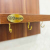 Decoratieve houten wand-sleutelhouder met plank & haken