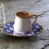 Artistiek Porseleinen Theeservies – Blauw Boze Oog