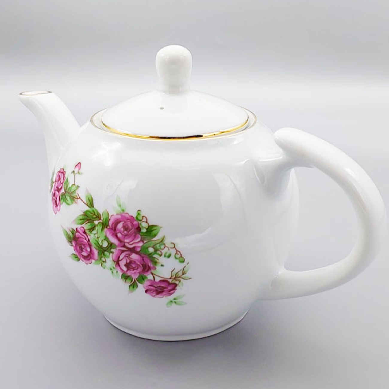 Porseleinen serveertheepot met bloemmotief in wit