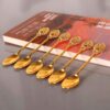 Gouden Barlepel Set met Vogel-Design – 6 Stuks met Houder