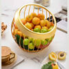 Stijlvolle draad-fruitmand in goud – functioneel & chic