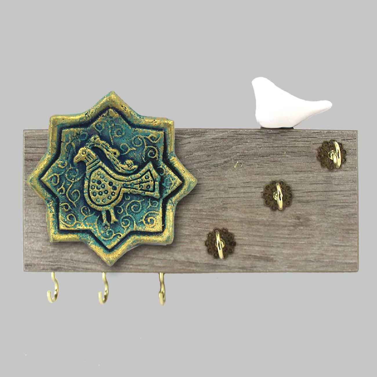 Decoratieve Muur Sleutelhouder voor een Mooi & Georganiseerd Huis met Tegel en Vogel Ontwerp