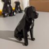 Geometrisch zwart zittende hond-figuurtje – moderne kubistische sculptuur