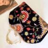 Geborduurde fluwelen clutch paisley zwart