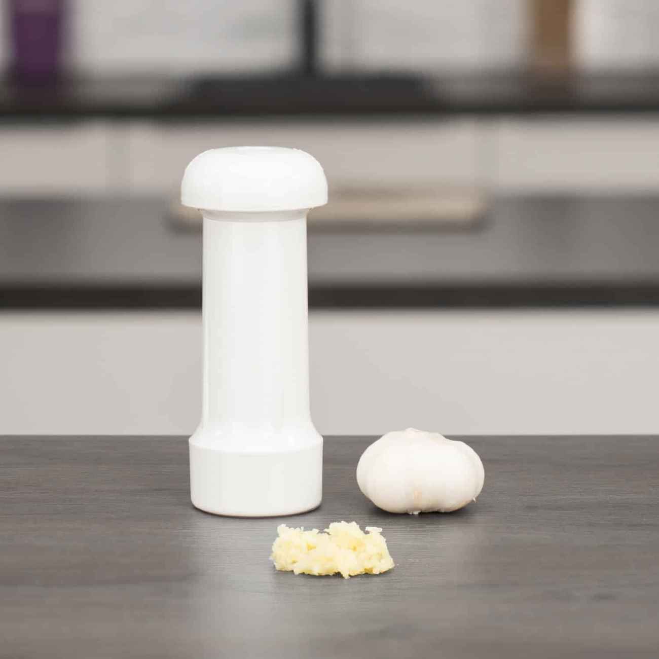 Handmatige knoflookpers en schiller set