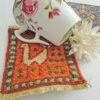 Oranje Pauw Kilim Onderzitter – Handgeweven Wollen Vierkant, Vogelpatroon