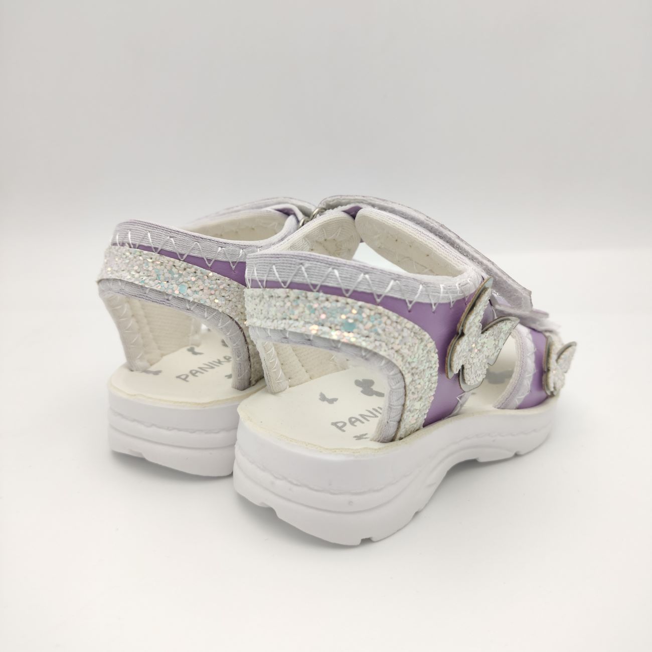 Elegante paarse meisjes sandalen met glitter en vlinder