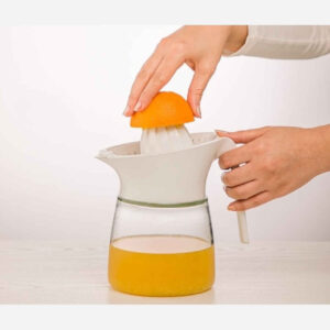 Pastelroze handpers – plastic handmatige citruspers
